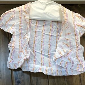 White short vest with pink and orange flowers